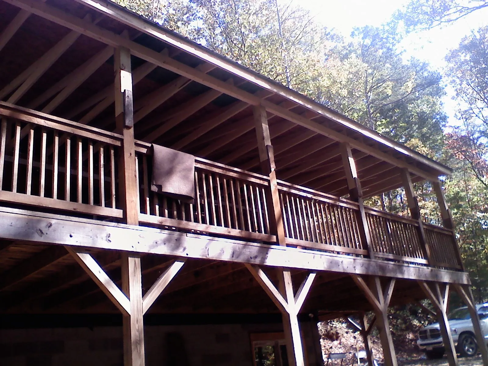 Timber framing under a new elevated porch and deck — Roof Leak Repair in Kokomo by Roofing Brothers